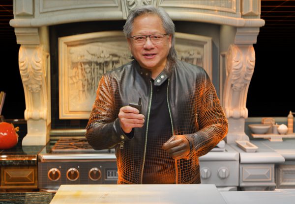 ג'נסן וואנג, מנכ"ל אנבידיה, עם התאום הדיגיטלי של המטבח מבית החברה. צילום: יח"צ